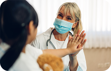 medical professional interacting with child