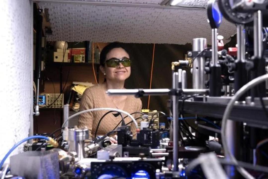 Ana Maria Rey in a lab at JILA. (Credit: R. Jacobson/NIST)