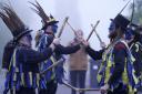 Members of the Hook Eagle Morris see in the May Day dawn (Andrew Matthews/PA)