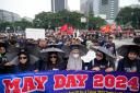 Activists took to the streets in Asian capitals and European cities on Wednesday to mark May Day with protests over rising prices and government labour policies, and calls for improved workers’ rights (Achmad Ibrahim/AP)