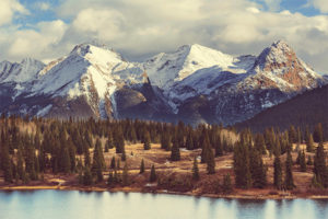 A lake in Colorado with mountains in the background