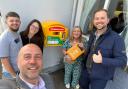 Cllr Wayne Little, Stuart Ross, Ruby Anne Queen, Nicola Preston and Cllr Adam Davies with the new Tenth Lock defibrillator