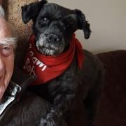 Bob Harvey and his dog Darcie. Image courtesy of Fostering Compassion