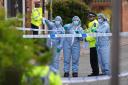 Forensic investigators in Laing Close in Hainault, north east London, after a 14-year-old boy died after being stabbed and a sword-wielding man arrested (Jordan Pettitt/PA)