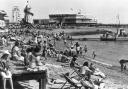 Looking out - residents and daytrippers flock to Southend seafront as they enjoy some time in the sun while looking out over the Thames Estuary in 1980s