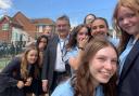 Family - Andrew Cooper, CEO, with pupils from Westcliff High School for Girls