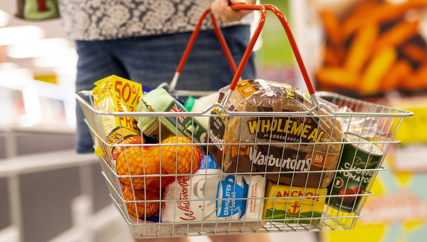 A basket of staple food items at an Iceland Foods Ltd. supermarket in Christchurch, UK, on Wednesday, June 15, 2022. "Britain's cost-of-living crisis -- on track to big the biggest squeeze since the mid-70s -- will continue to worsen before it starts to ease at some point next year," said Jack Leslie, senior economist at the Resolution Foundation, a research group campaigning against poverty. Photographer: Chris Ratcliffe/Bloomberg via Getty Images