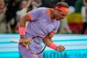 Rafael Nadal clenches his fist after winning the first set (Manu Fernandez/AP)