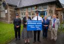 Alison Hernandez visiting Okehampton Police Station last summer; its front desk will reopen this week