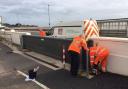 Flood gates being put in place at Exmouth seafront