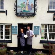 Dan Kavanagh and Amber from the Sir Walter Raleigh with their rosette award