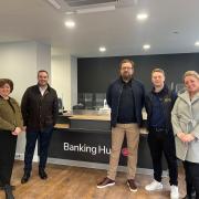 Simon Jupp MP in Sidmouth’s Banking Hub with (L to R) new manager Janet, Dave and Jon from Priory Concept Group, and Sonja Critchley from Cash Access UK