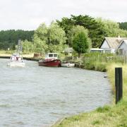 The River Waveney in St Olaves near the Priory Farm and Restaurant.