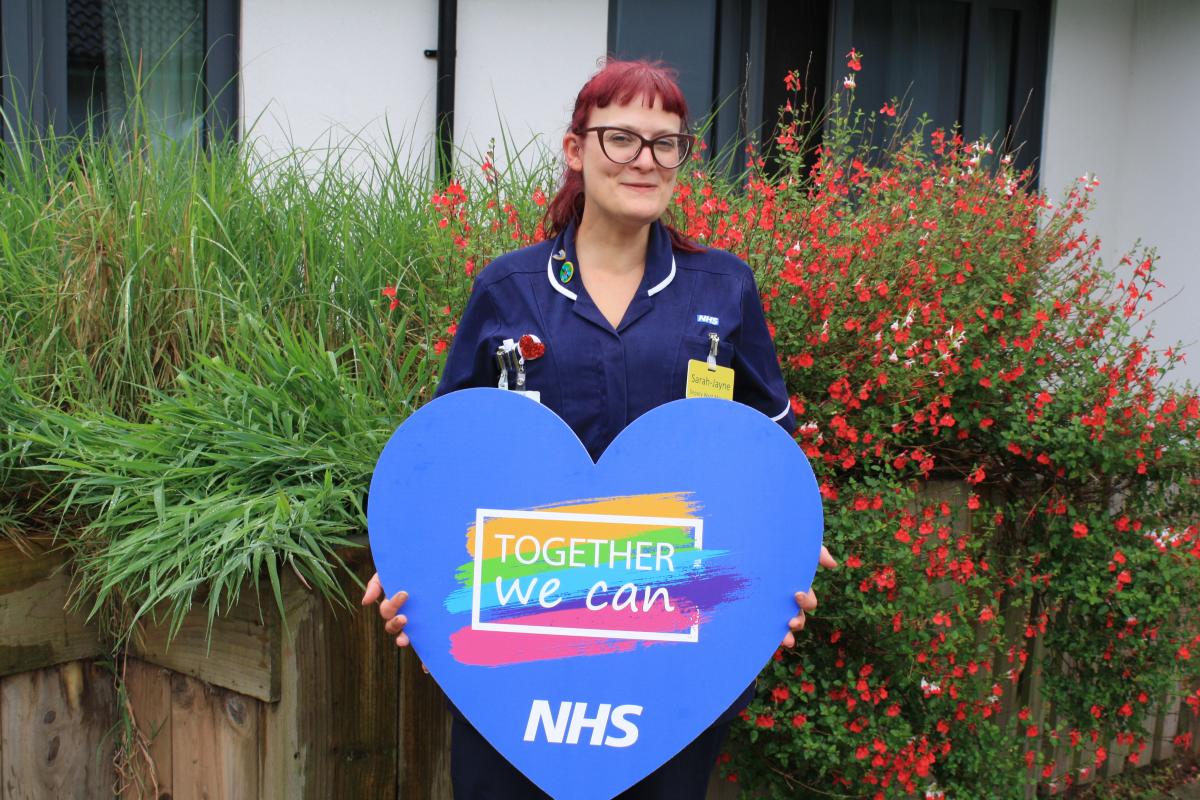 Image of staff member with together we can sign
