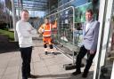 By part of the Courtyard's exterior which requires work, from left: chief executive Ian Archer, Michal Kosciukiewicz of Vertex Access, and theatre board chairman Bruce Freeman.