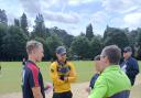 Herefordshire skipper Matt Pardoe (left) and his Glamorgan counterpart James Harris receive their pre-match instructions from umpires Sue Redfearn and John Farrell.