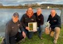 Mark Taylor, holding the certificate Allensmore Nurseries won earlier this year, with colleagues