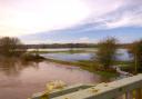 Flooding over the meadows on the edge of Hereford, pictured from Outfall Works Road