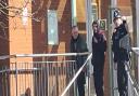 Michael Croke (left) leaving Hereford Magistrates Court