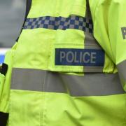 Car flips in crash in busy Hereford city centre street