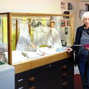 Carole Page with one of the exhibits at the museum