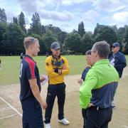 Herefordshire skipper Matt Pardoe (left) and his Glamorgan counterpart James Harris receive their pre-match instructions from umpires Sue Redfearn and John Farrell.