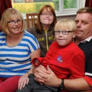 Sebastian Farmer with his twin sister Charlotte and parents Sharon and Tom