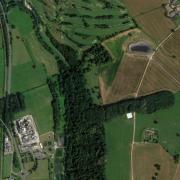 Aerial view of the lagoon near the river Lugg, with the A49 and Marlbrook chocolate factory beyond