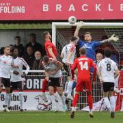 Hereford goalkeeper Curtis Pond rises high to make a save during his side’s match against Brackley Town