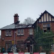 The roof of Victoria House is devastated after the fire