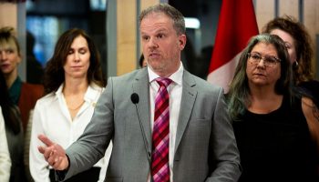 Minister of Health Mark Holland holds a press conference at the Centretown Community health centre on Feb. 29, 2024, to speak with reporters about the government’s introduction of the Pharmacare Act.