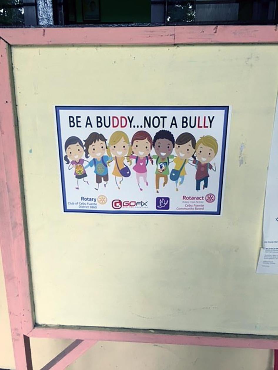 A poster for an anti-bullying campaign hangs on a wall at a secondary school outside Cebu, November 2016. 