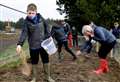 Pupils join in efforts in bid to create flower display at Tomatin