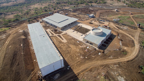 Interior fit out and external land formation continue to progress. Benches have begun to be installed in the courtyard, and the staircase and ramp between the courtyard and office building await final finishes. 