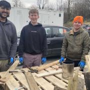 Students working on creating a bug hotel