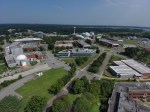 This is an aerial photograph of NASA Langley Research Center. Langley's Hypersonic Facilities Complex, comprised of four large vacuum spheres, can be seen in the background.