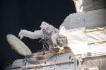 NASA astronaut Mike Hopkins is pictured outside the Quest airlock where spacewalks are staged in Extravehicular Mobility Units (EMUs), or spacesuits.