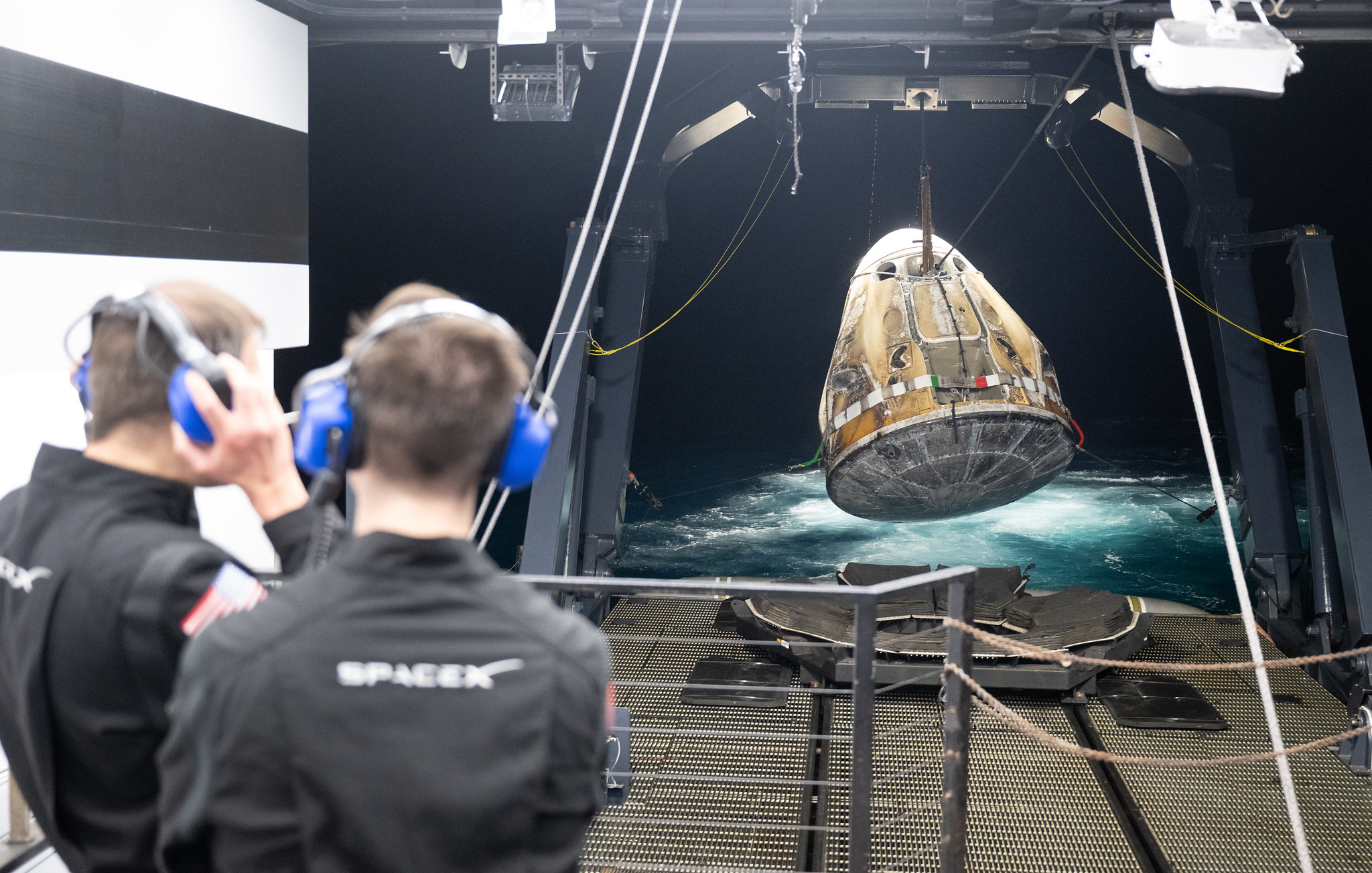 Support teams raise the SpaceX Dragon Endeavour spacecraft aboard the recovery ship MEGAN shortly after it landed with NASA astronauts Stephen Bowen and Warren "Woody" Hoburg, UAE (United Arab Emirates) astronaut Sultan Alneyadi, and Roscosmos cosmonaut Andrey Fedyaev aboard in the Atlantic Ocean off the coast of Jacksonville, Florida, Monday, Sept. 4, 2023.