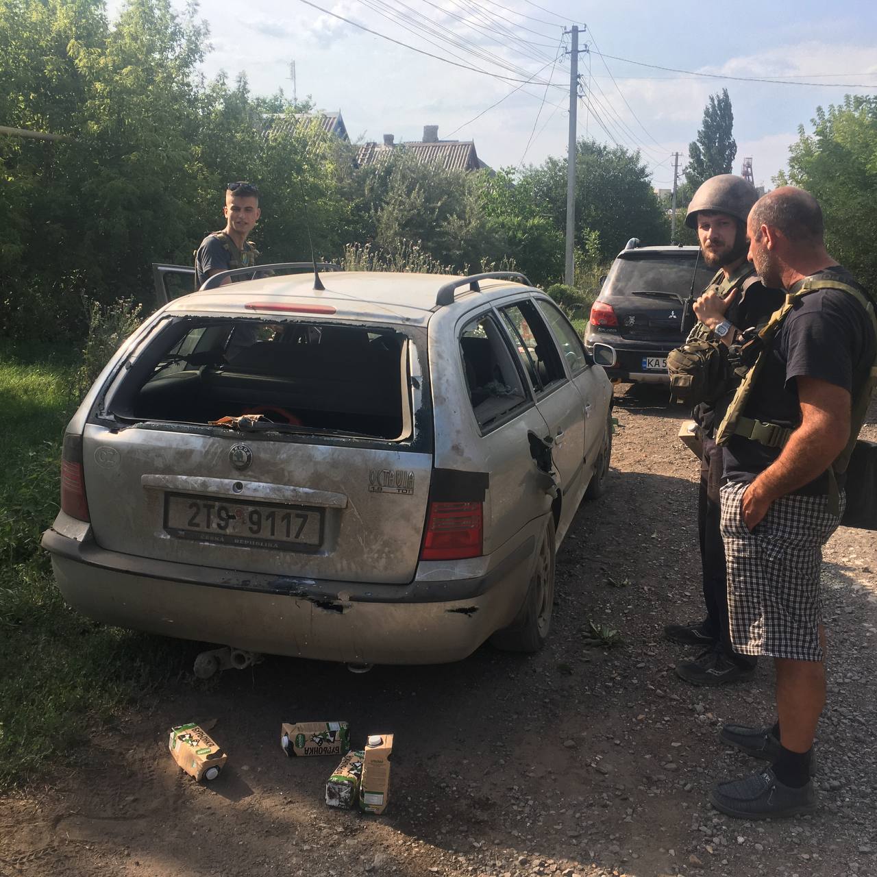 Bagshaw's car after a shell landed next to it. Photo / Supplied