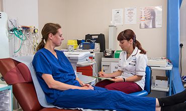 Doctor examining a patient