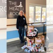 Gillian Wrigley with donations from her two charity pilates classes. Photo: Tweed Togs