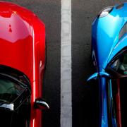 Stock image of cars parked. Photo: Unsplash/Possessed Photography