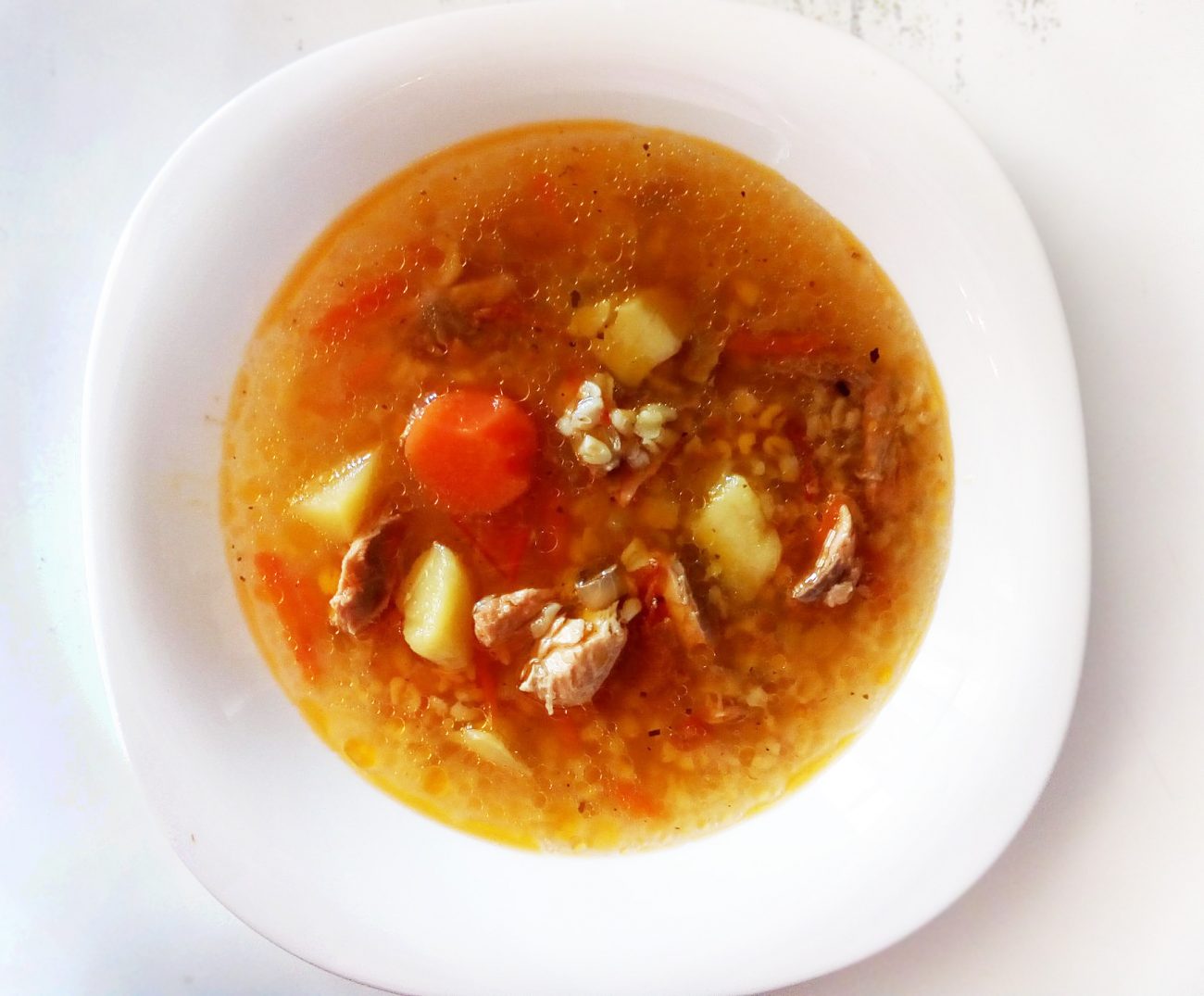 Томатный рыбный суп с булгуром