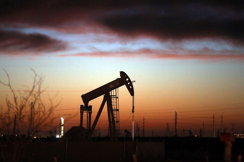 ANDREWS, TX - JANUARY 20:  An oil pumpjack works at dawn in the Permian Basin oil field on January 20, 2016 in the oil town of Andrews, Texas. Despite recent drops in the price of oil, many residents of Andrews, and similar towns across the Permian, are trying to take the long view and stay optimistic. The Dow Jones industrial average plunged 540 points on Wednesday after crude oil plummeted another 7% and crashed below $27 a barrel.  (Photo by Spencer Platt/Getty Images)
