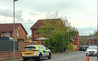 Police on Fisher Street on Monday