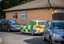 Police at the scene in Welland Court, Cheltenham