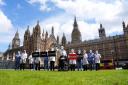 Campaigners on opposite sides of the argument gathered outside Parliament ahead of a debate on assisted dying (Jordan Pettitt/PA)