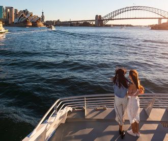 Friends on whale watching aboard Captain Cook Cruises on Sydney Harbour 