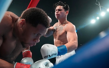 Ryan Garcia knocks down Devin Haney