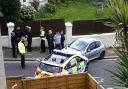 A man was arrested for dangerous driving following a crash with a police car in Brighton on Sunday afternoon